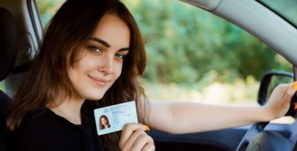 women hoilding Driving licence