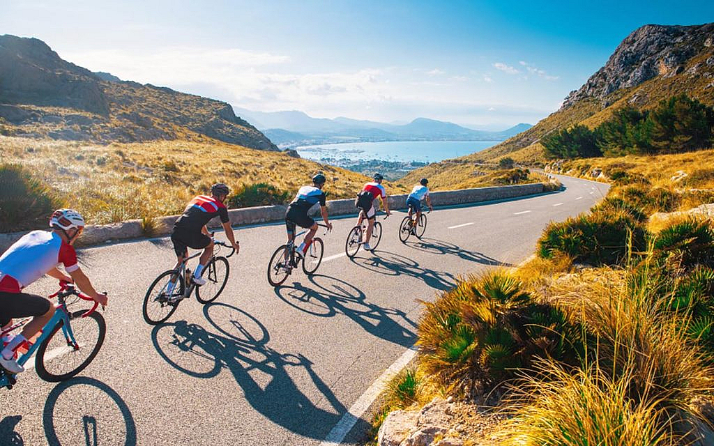 Group of cyclists on a road bicycle