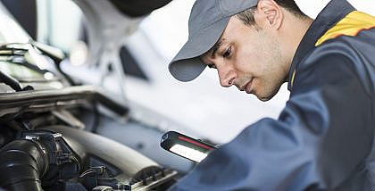 A mechanic is checking a bad secondary air pump