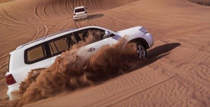 SUVs driving in the desert