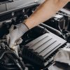 Mechanic checking the car engine
