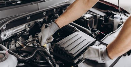 Mechanic checking the car engine