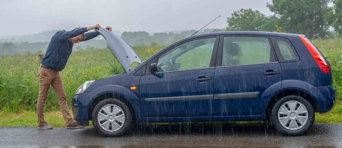 jump start a car in the rain