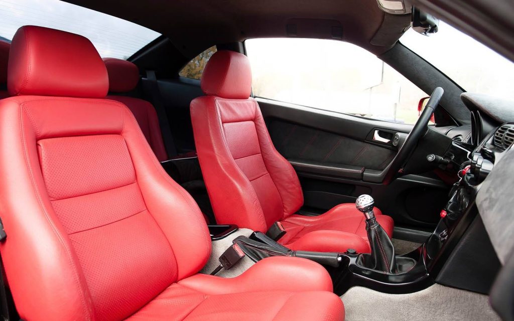The padded seats indicate lumbar support in a car