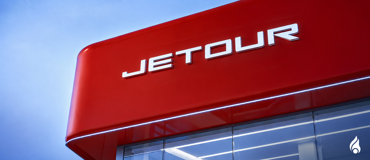 Jetour dealership exterior with logo and signage.