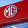 MG Motors logo on red board