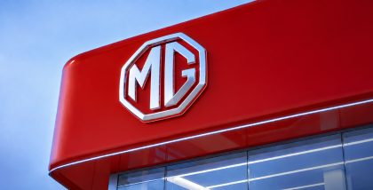 MG Motors logo on red board