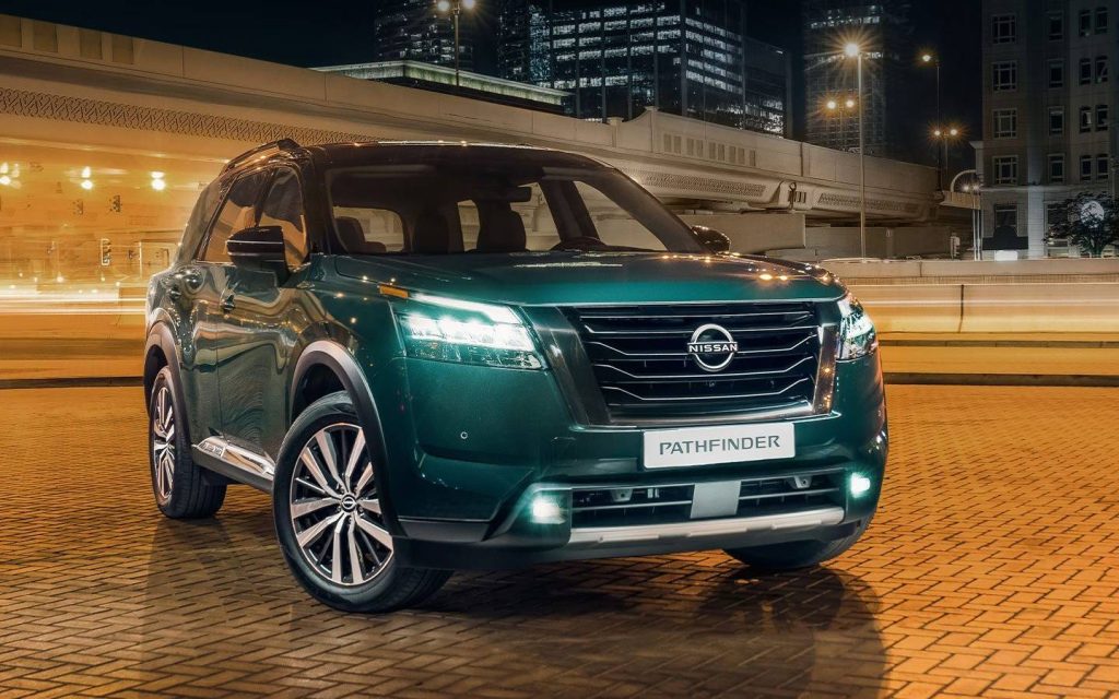 nissan pathfinder parked outdoors in a night scene