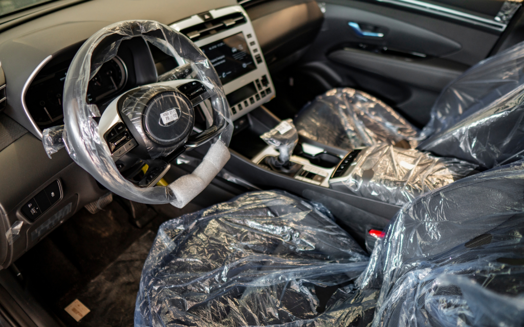 Car interior wrapped in plastic