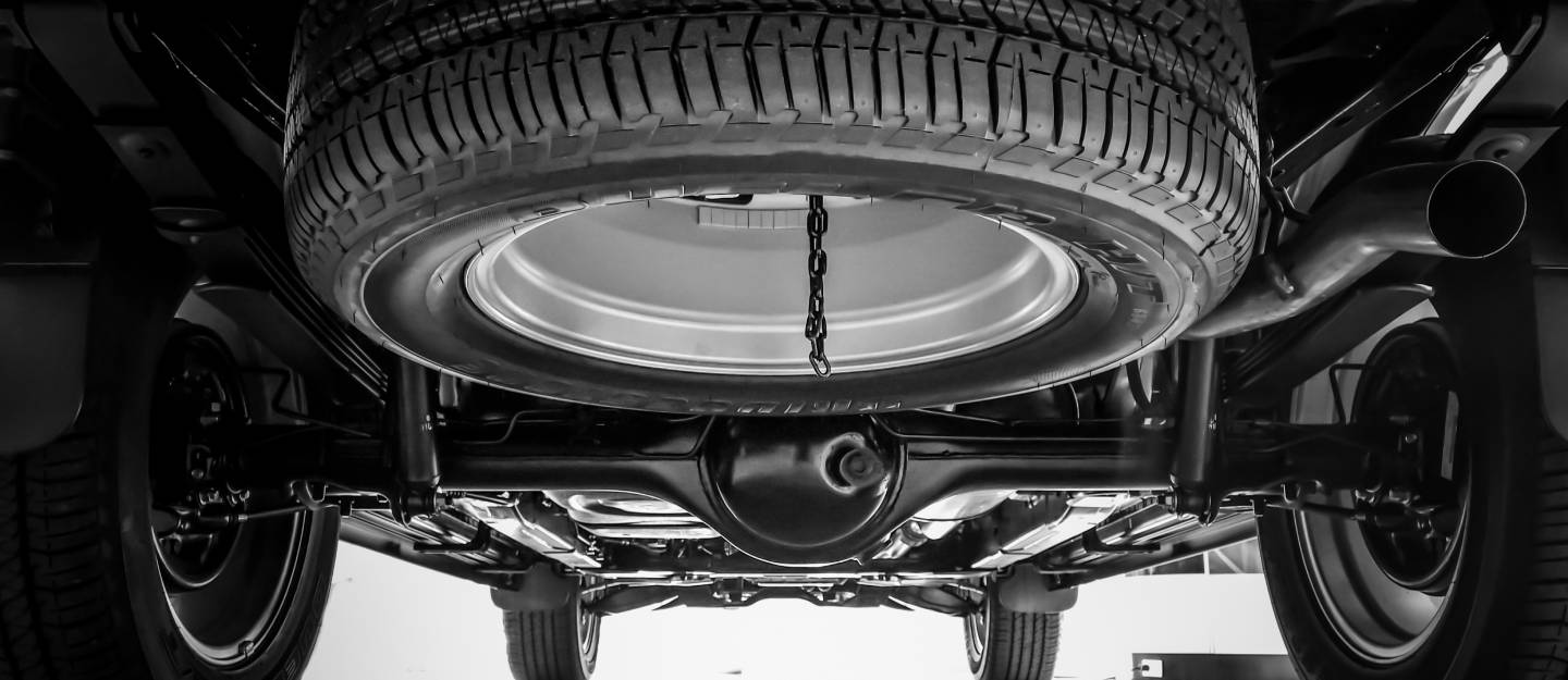How to Dismount a Spare Tyre from Underneath a Vehicle