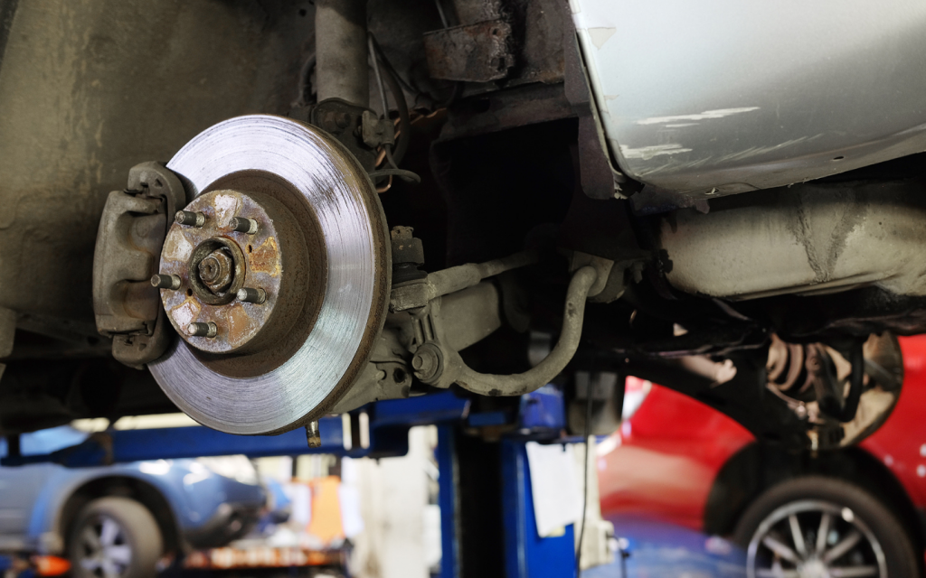 brake calliper of a car in a mechanic shop