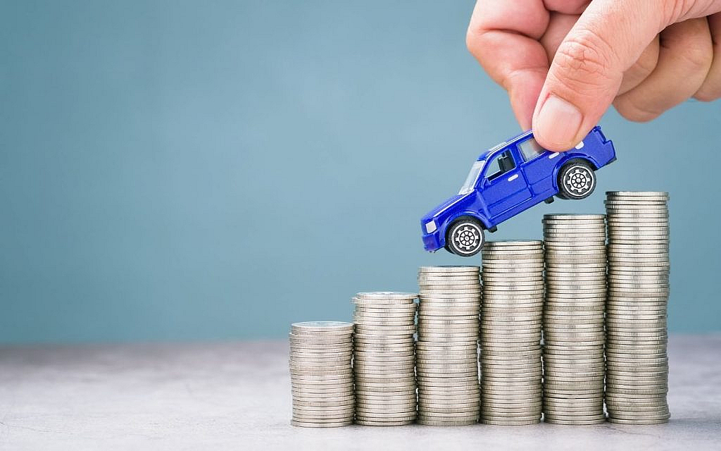A car sliding down from coin towers
