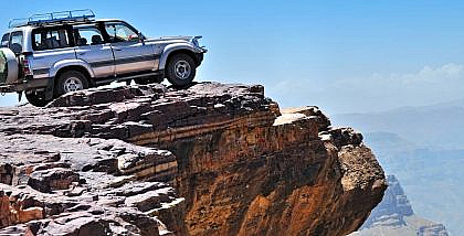How to Get out of a Car That's Hanging over a Cliff