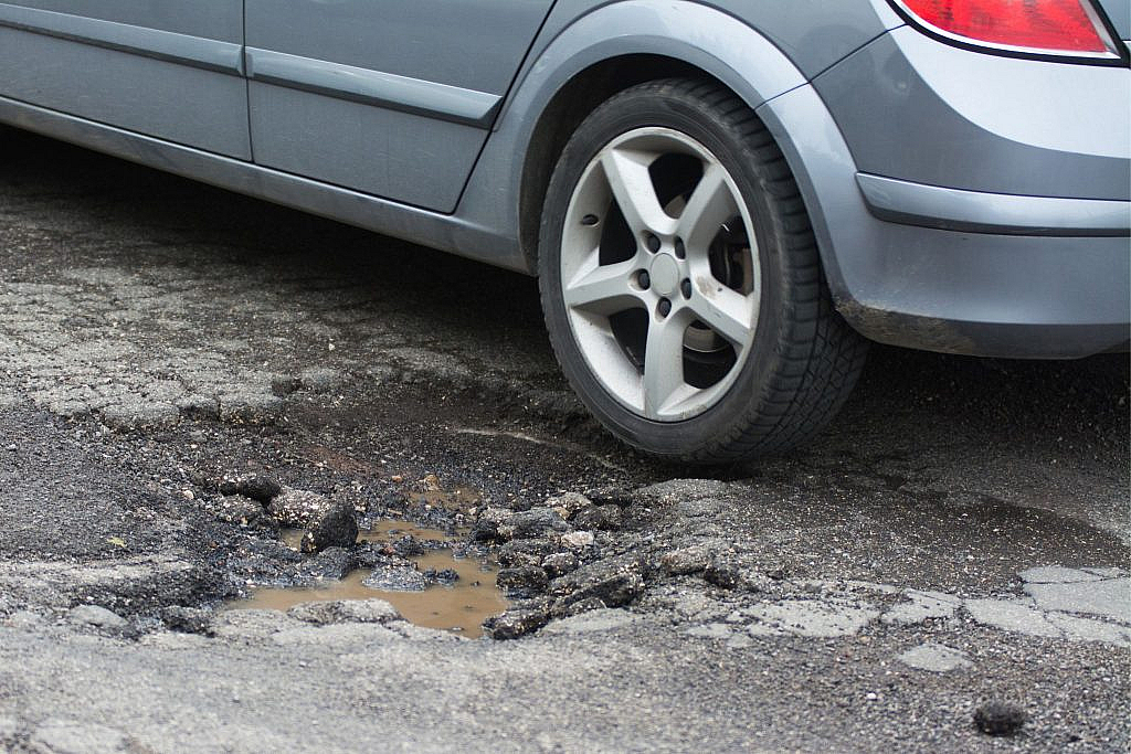 Potholes can damage car tyres if you won't take safety measures 