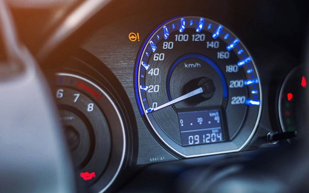 Infotainment system showing the mileage of a car