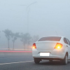 Car hazard lights during fog