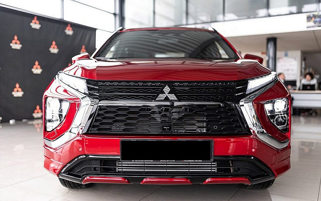 Red colour Mitsubishi SUV