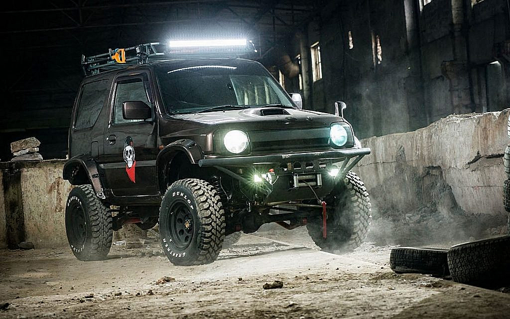 black off-roading vehicle on a rocky terrain