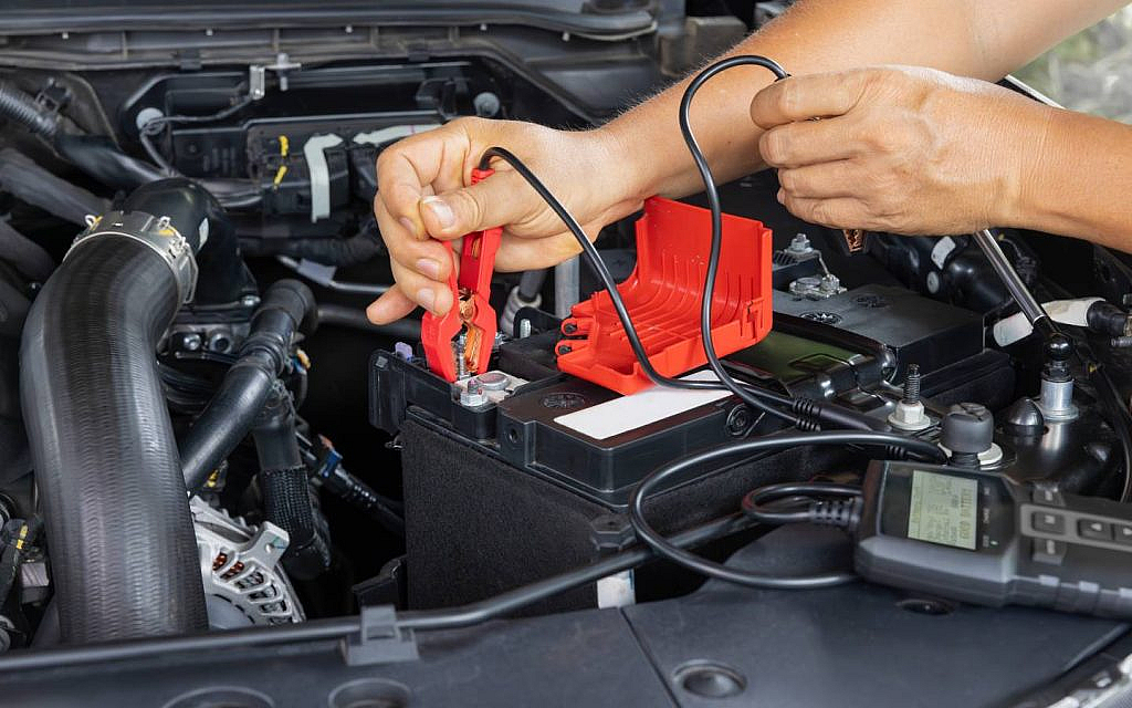 remove the car's battery to avoid drainage when the vehicle is in storage