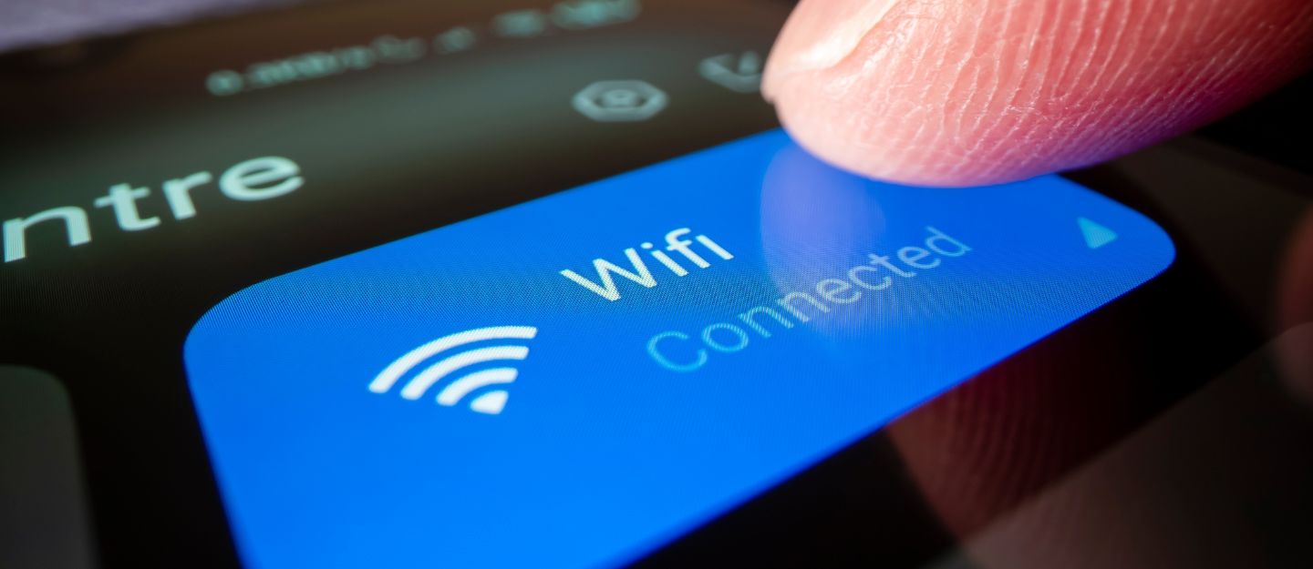 man connecting a wifi