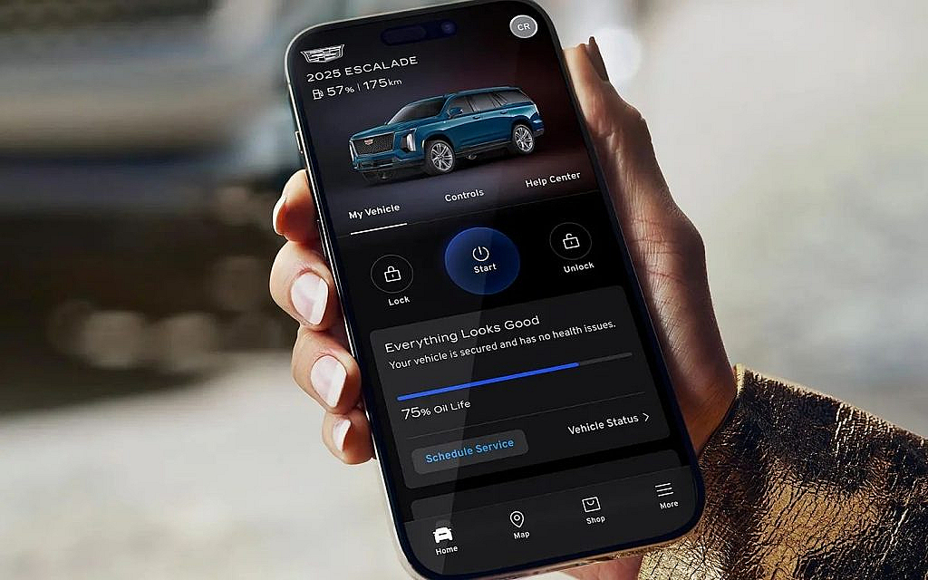A man using Cadillac app on phone
