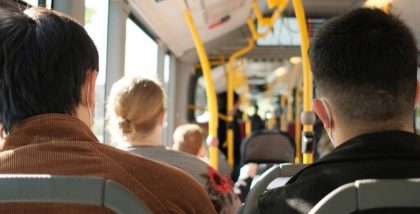 people riding the bus