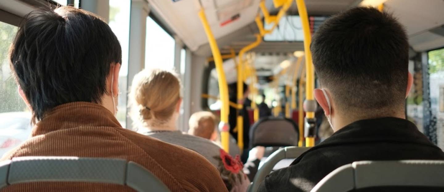 people riding the bus
