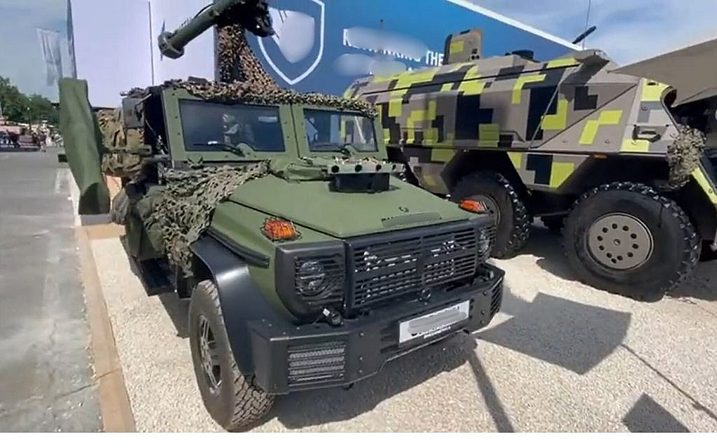 Mercedes-Benz G-Class military vehicle, parked in a rugged environment, highlighting its utilitarian