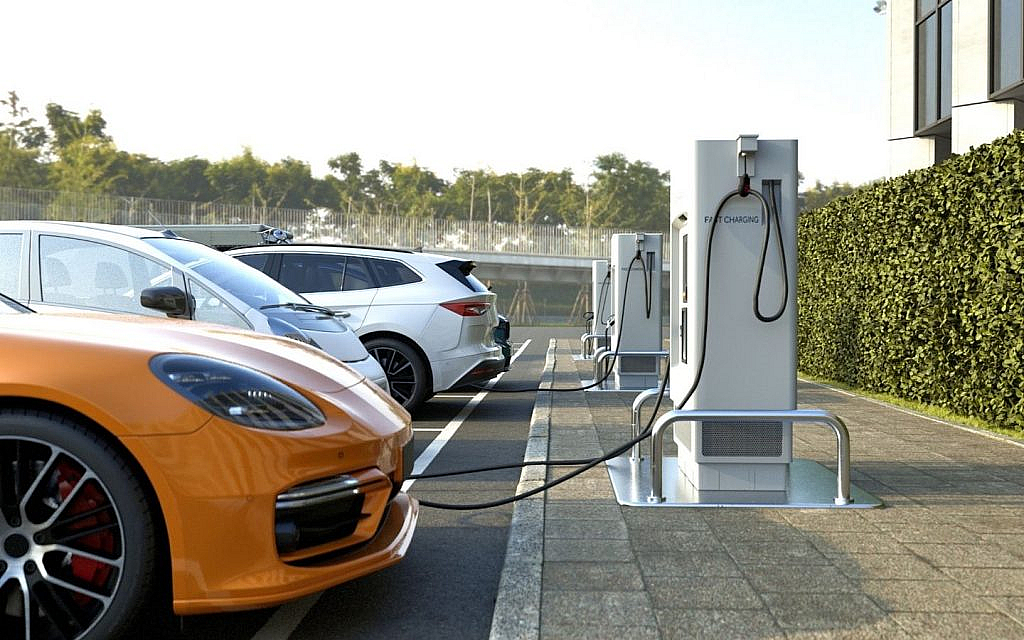 A car plugged in a charging station