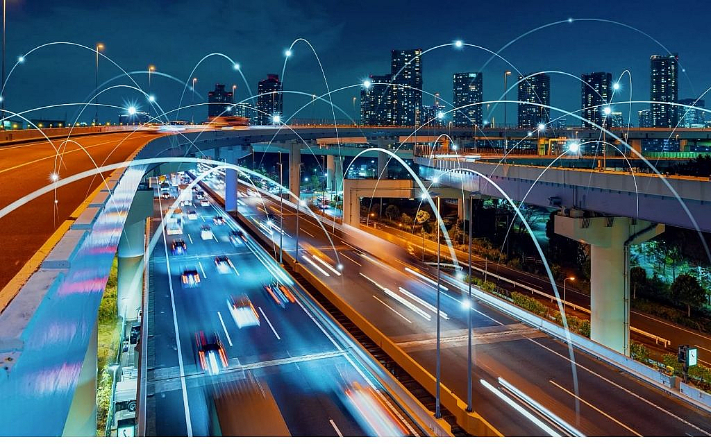 An EV driving through a smart city