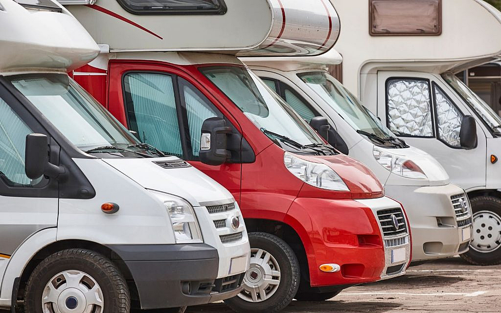 recreational vehicles parked in a row