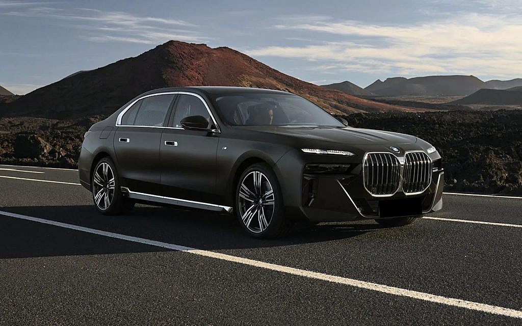 latest black BMW 7 on the road