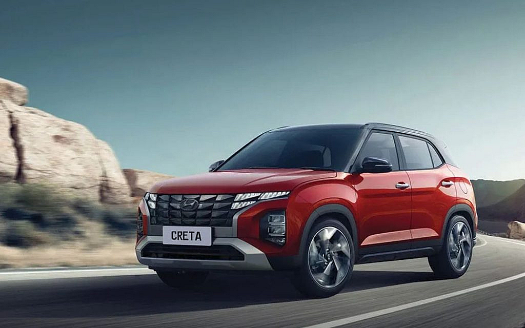 Red colour Hyundai Creta on a hilly road 