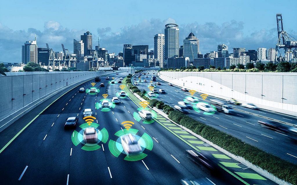 autonomous cars on the road with visible sensor waves and digital overlays illustrating their safety and detection systems.
