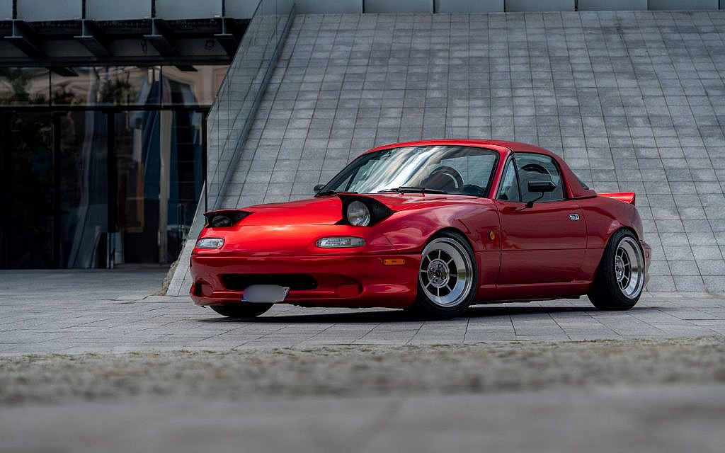 The Mazda MX-5 Miata NA is a classic known for its nostalgic, playful pop-up headlights.