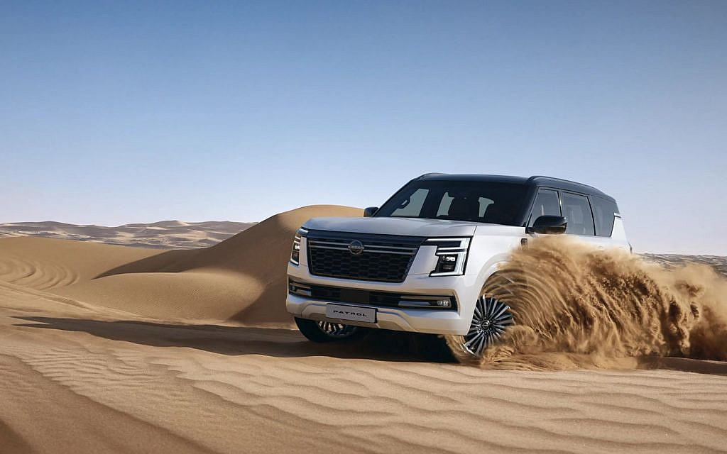 2025 Nissan Patrol crossing a sand dune