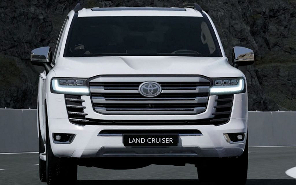 Front fascia of white Land Cruiser