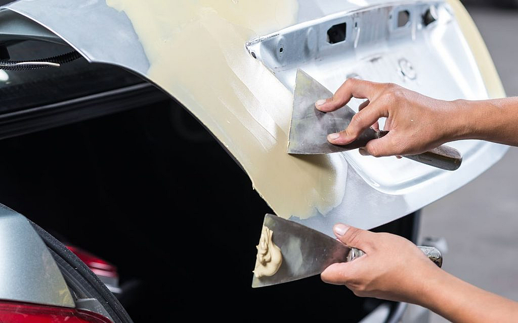 Sanding in stages is key to a flawless repair.