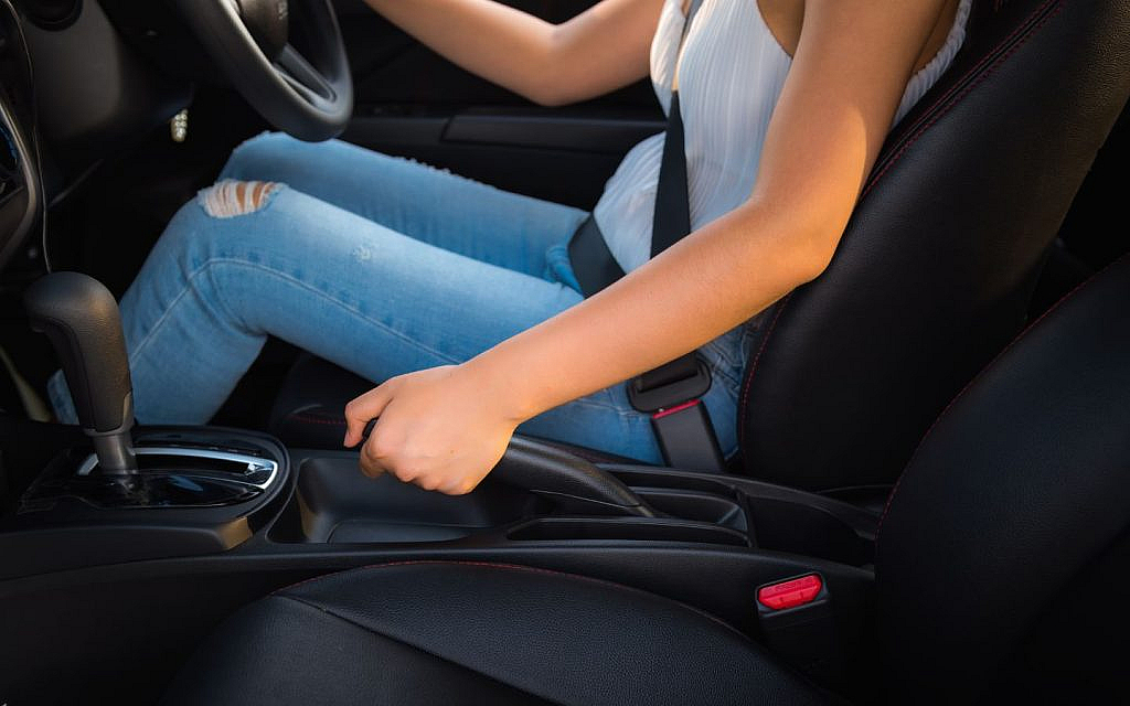 The parking brake mainly secures the car but can serve as an emergency backup.