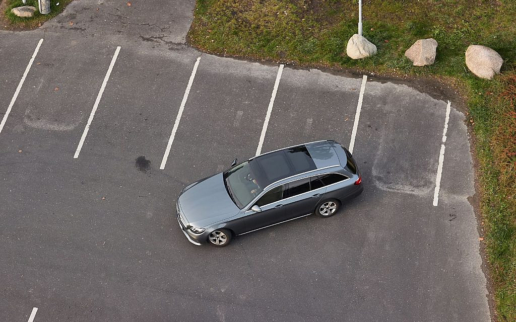 Reverse parking lowers accident risk compared to forward parking in busy lots.