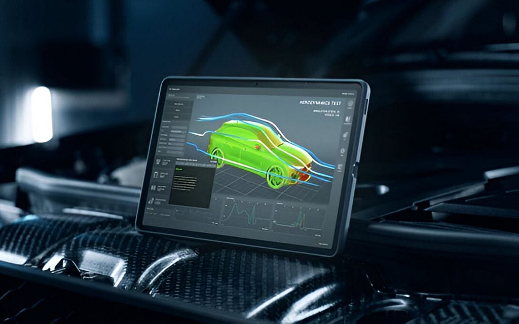 An engineer checking car aerodynamics on a screen