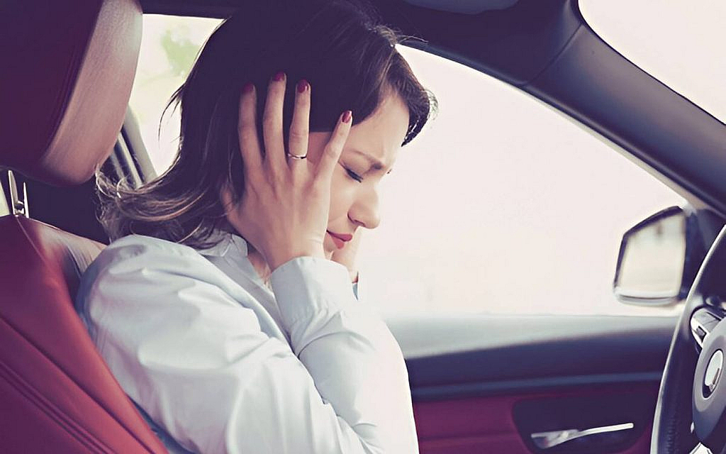 one of the common broken coil spring symptoms is strange noises from the car