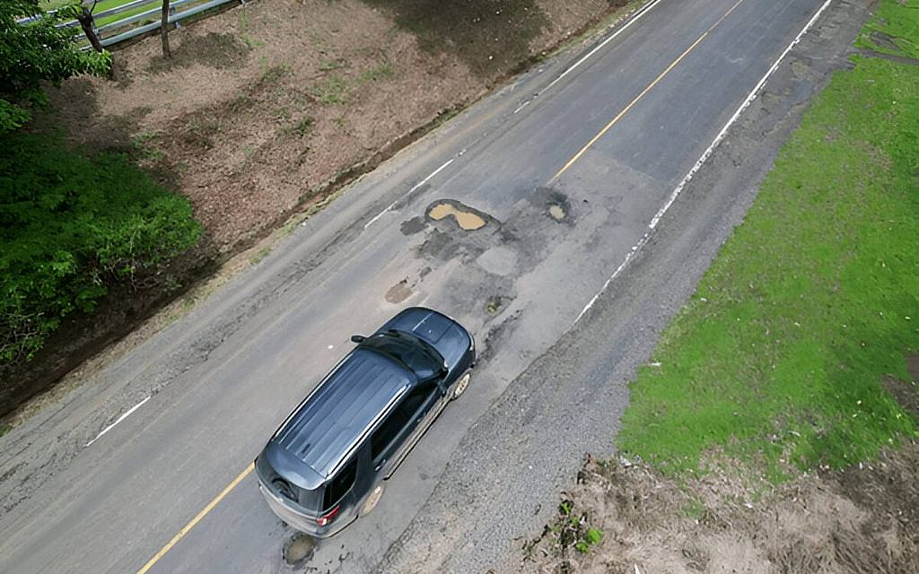 roads with potholes and bumps can damage engine components