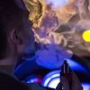 man vaping in car