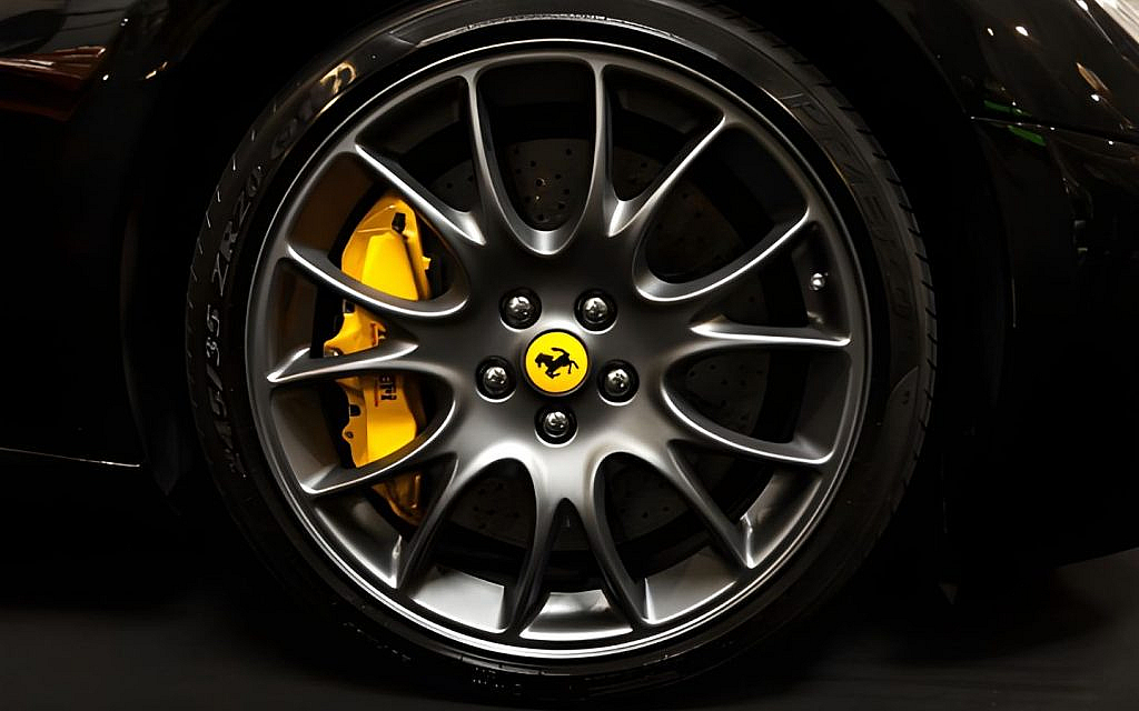 Ferrari tyre with red coloured brake