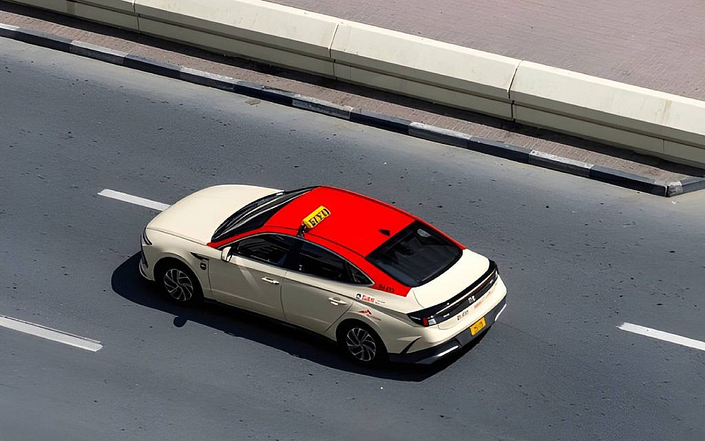 in the Dubai taxi roof colors meaning guide, red taxis are the ones by DTC