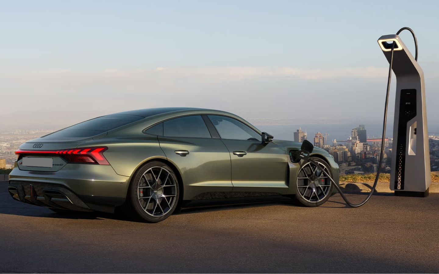 Metallic green Audi RS e-tron GT Performance charging