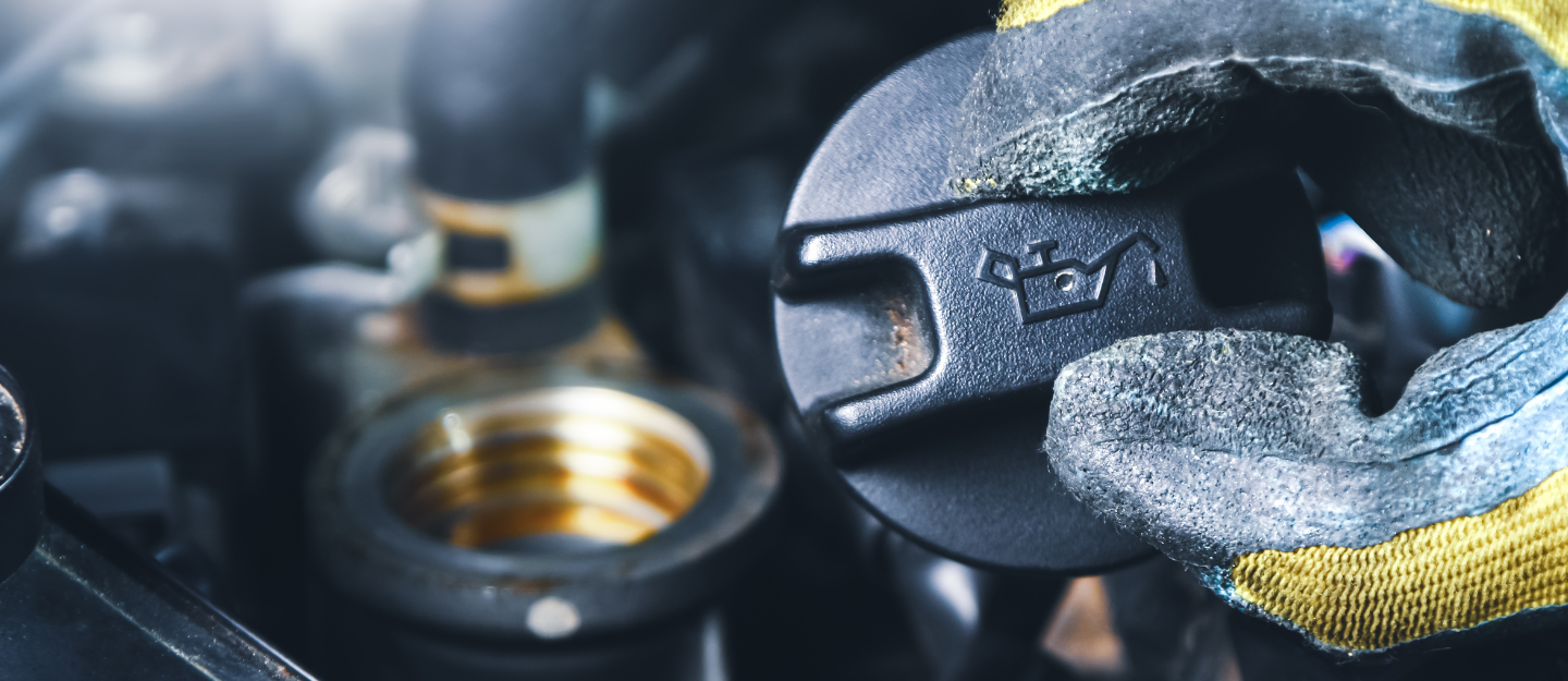 Smoke coming out of the oil cap