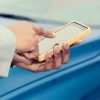 man using an app on phone