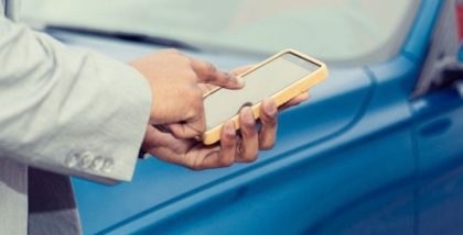 man using an app on phone
